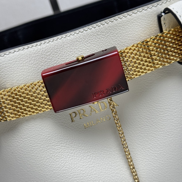 Pra*a buckle leather bucket bag with jeweled belt